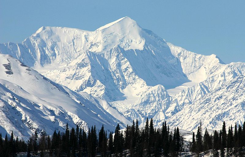 Mckinley While its summit is lower in elevation than Mt. Everest’s, Mt. McKinley’s peak raises 18,000 feet from its base, 6,000 feet more than Mt. Everest. (Wikimedia Commons)