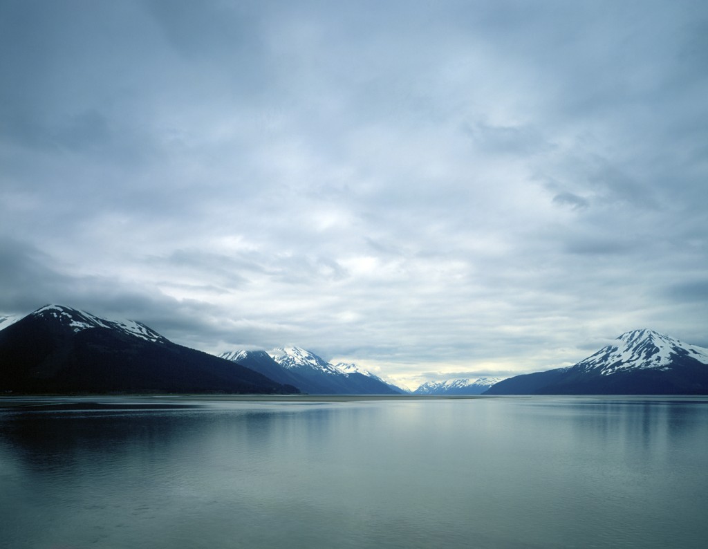 mountain range on the coast, touching the bay.