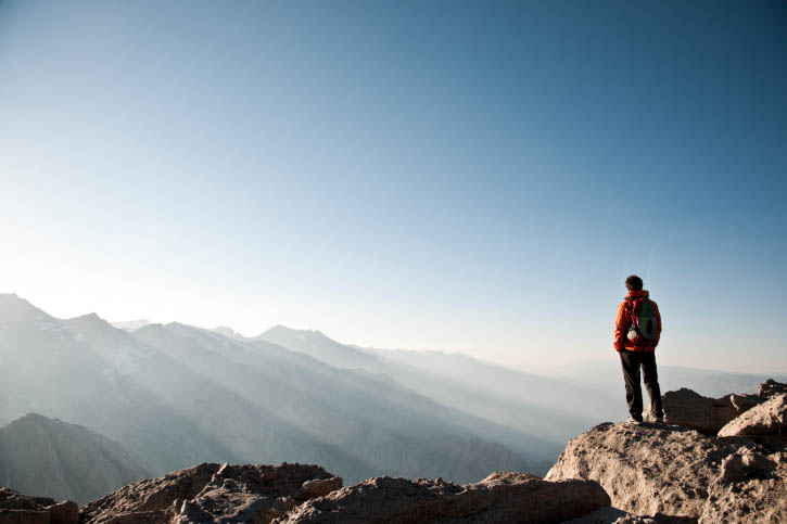 lone mountaineer at summit