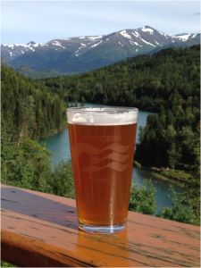 A beer on the railing at Kenai Princess Wilderness Lodge