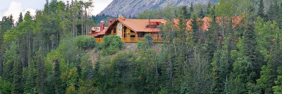 Exterior of lodge facing the river.