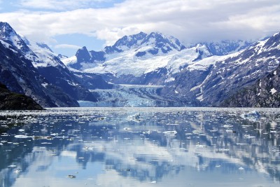 Alaska is Glacier Heaven - towering mountains with a glacier at their foot leading into a bay dotted with ice