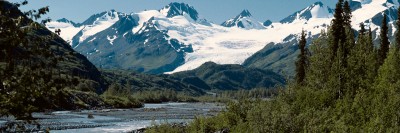 Alaskan River with snowy mountains in the background