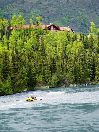 River rafters in the river below the Kenai Princess Lodge