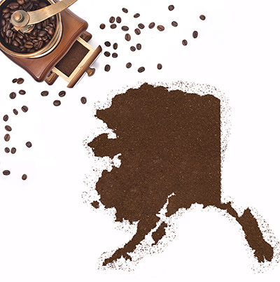 Coffee grounds in the shape of the state of Alaska