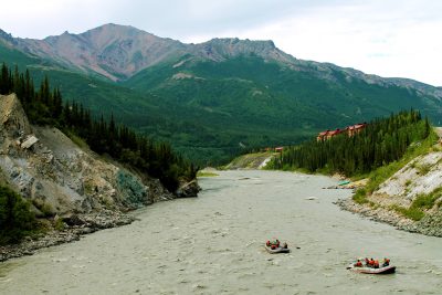 Two rafts float on the Nenana River