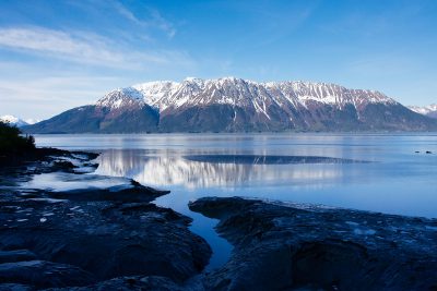 Low tide of Turnagain Arm with mountain in the background.