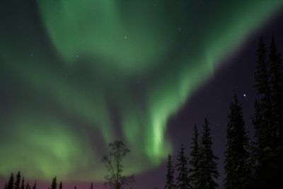 The glowing green sky of the aurora borealis