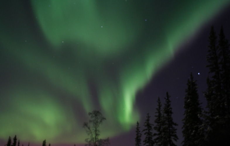 The glowing green sky of the aurora borealis