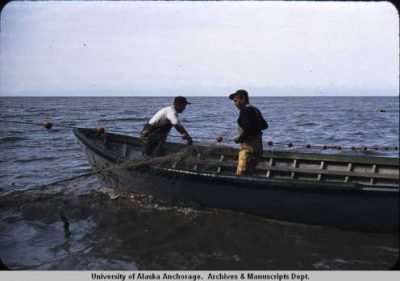 Fishermen in a boat in 1959.