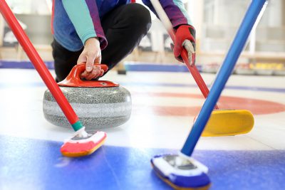 Curling equipment on the ice.